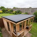 Finished timber summerhouse with a one-piece black EPDM rubber roof and black uPVC edge trims - garden roof kit with plastic trims