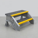 Detail of two-tread GRP access steps showing gritted anti-slip mesh treads and yellow nosing