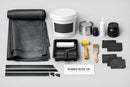 Orangery EPDM rubber roof kit contents: EPDM membrane, water-based deck adhesive, contact adhesive, sealant cartridge, primer, rollers, edge trims and corner patches