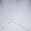 Foil-faced PIR insulation boards laid tightly butted as a completed warm roof insulation layer