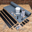 Rubber extension roof kit contents laid out on an OSB deck: 1.2mm EPDM membrane, deck adhesive, contact adhesive, primer, gutter and kerb trims, wall flashing, corners, patches, rollers, brush, scissors and fixings
