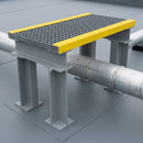 Tall GRP step-over platform on I-beam legs straddling a large lagged pipe run on a flat roof