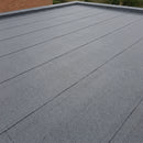 Completed flat garage roof finished in charcoal mineral surfaced bitumen felt with neat lapped seams