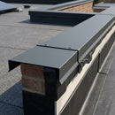 Anthracite grey aluminium parapet coping installed on a flat roof EPDM membrane wall