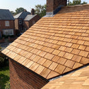 Western red cedar roof shingles installed on a traditional UK pitched roof