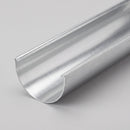 Close-up detail of a cut length of natural zinc half round guttering showing the plain metal profile and finish